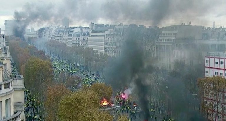 Black Cloud Of Smoke Over Champs-Elysees